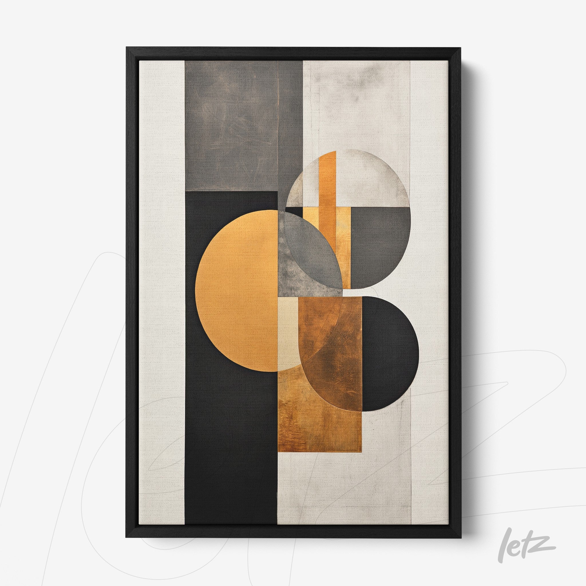 modern framed wall art featuring geometric shapes in black, gray, and gold tones