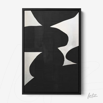 modern artwork featuring abstract black and white shapes in a thin black frame