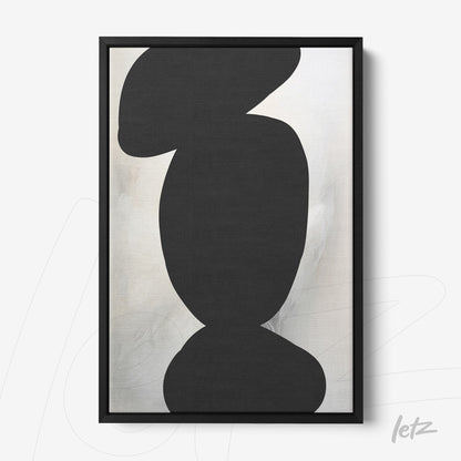 abstract wall art in black and white with a slim black frame and light background
