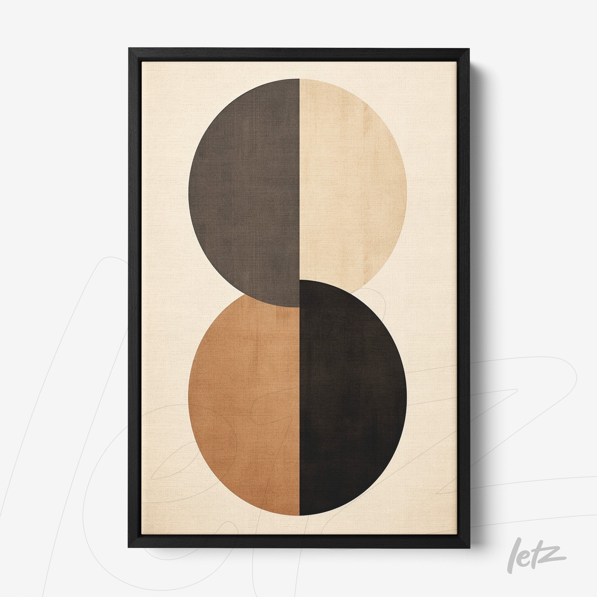 framed abstract art piece featuring two interlocking circles in earthy tones
