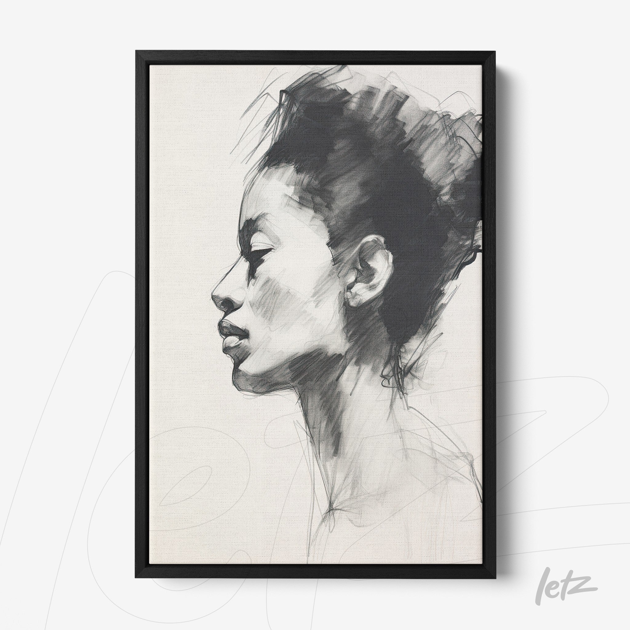 framed art featuring a minimalist portrait of a woman's profile in shades of gray