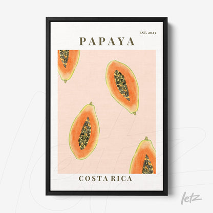 framed artwork featuring papaya illustrations on a pink background with 'Costa Rica' text at the bottom and a black frame
