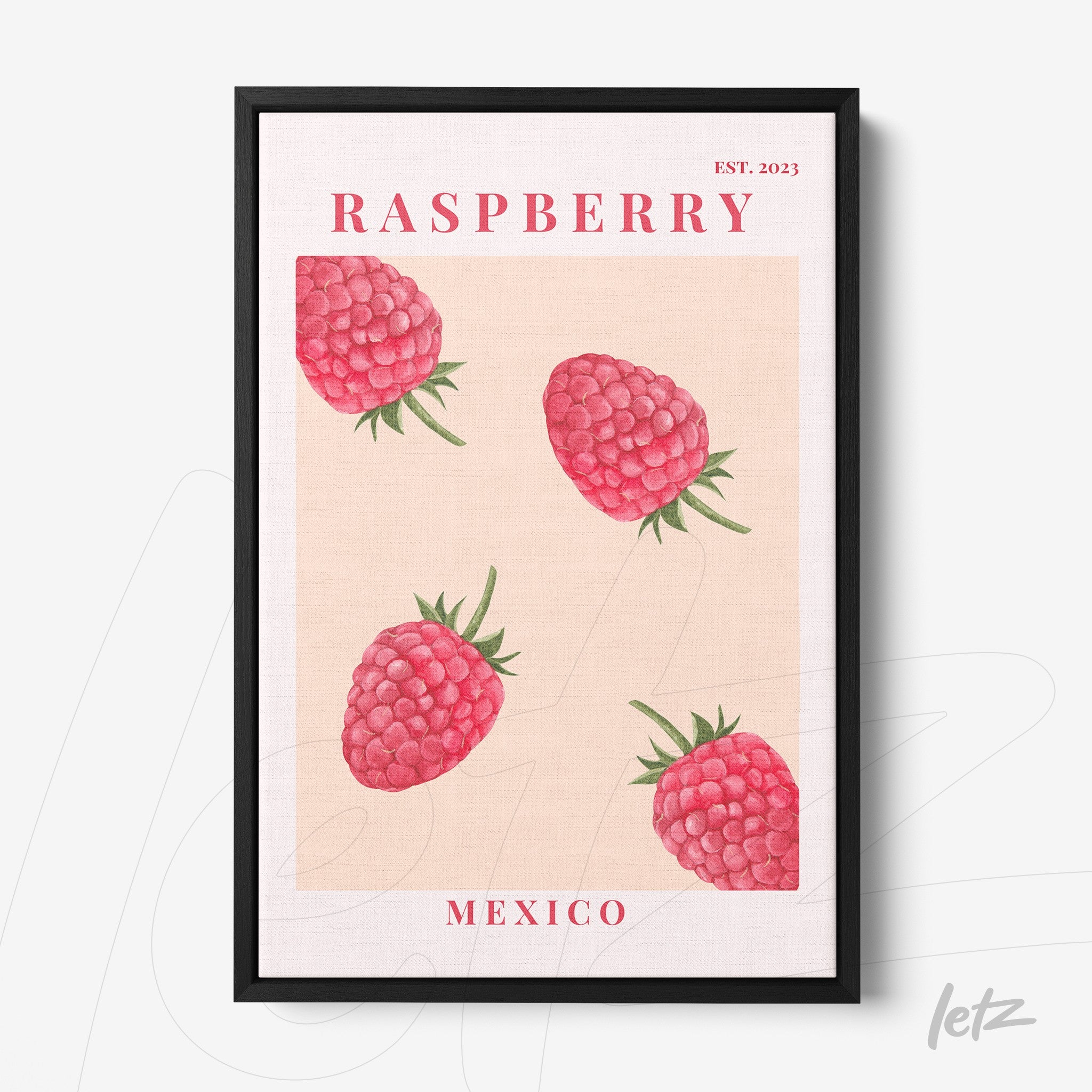 framed wall art featuring raspberries on a light background with black frame and stylized red text