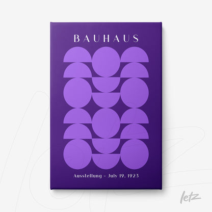 canvas with geometric art inspired by the Bauhaus movement in shades of purple on a dark background