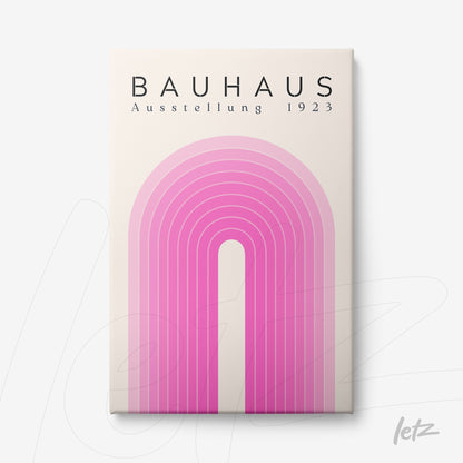 poster print featuring pink arc geometric design with 'bauhaus ausstellung 1923' text displayed on a white background