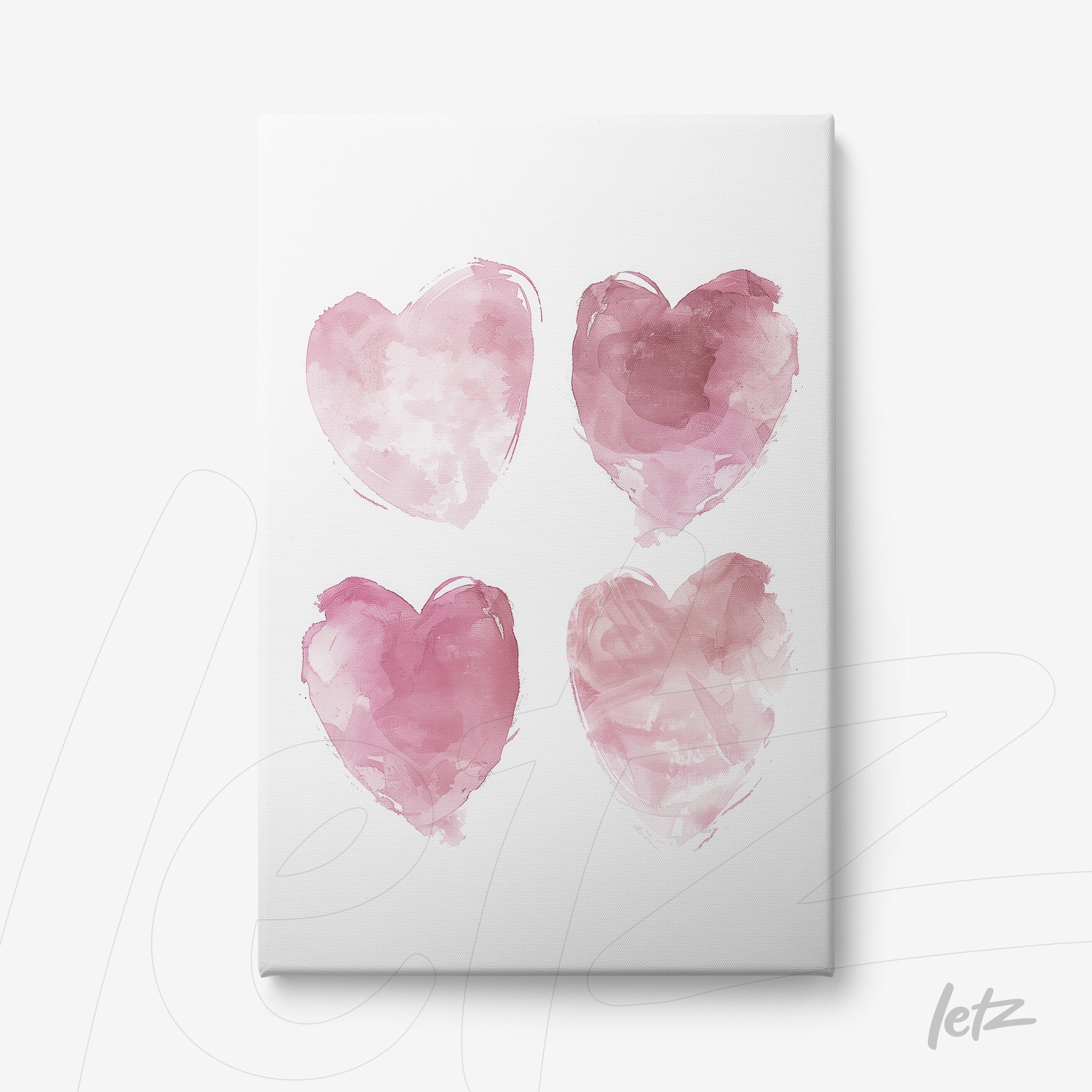canvas art featuring four hearts in pink tones against a white background