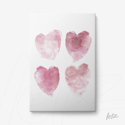 canvas art featuring four hearts in pink tones against a white background