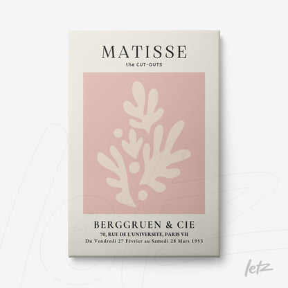 framed wall art featuring abstract design in light pink background with white organic shapes