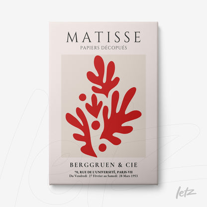 framed wall art featuring cut paper design by Matisse with red organic shapes on a light background