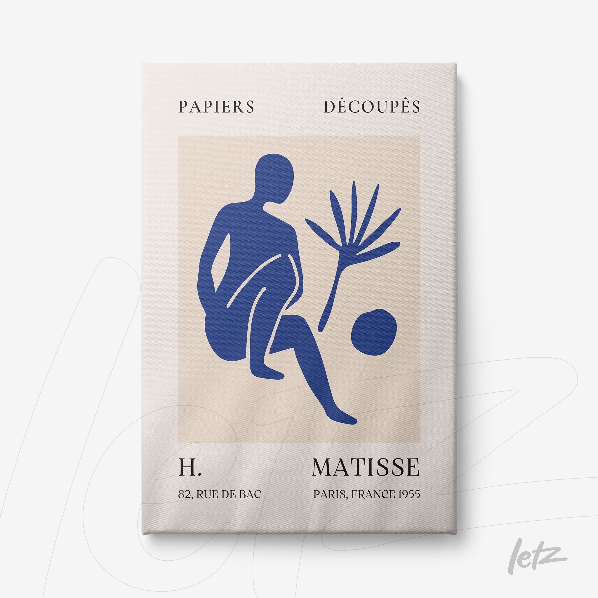 framed art featuring a blue illustration of a seated human figure next to a leaf and a ball, set against a light background with simple typography