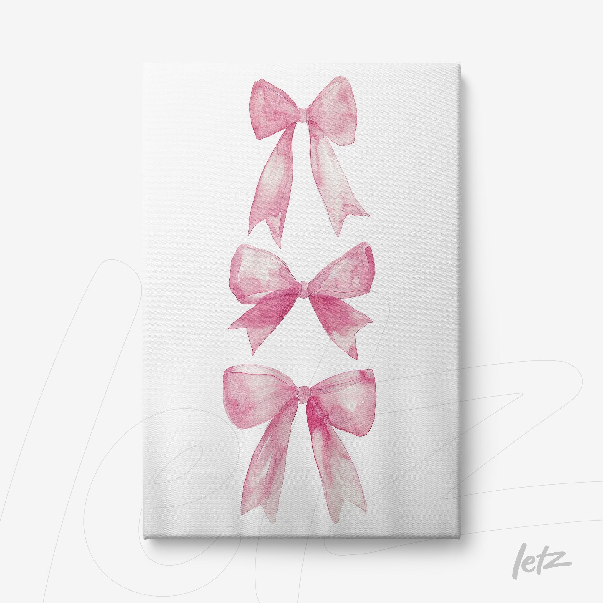 canvas print featuring three watercolor pink bows on a white background