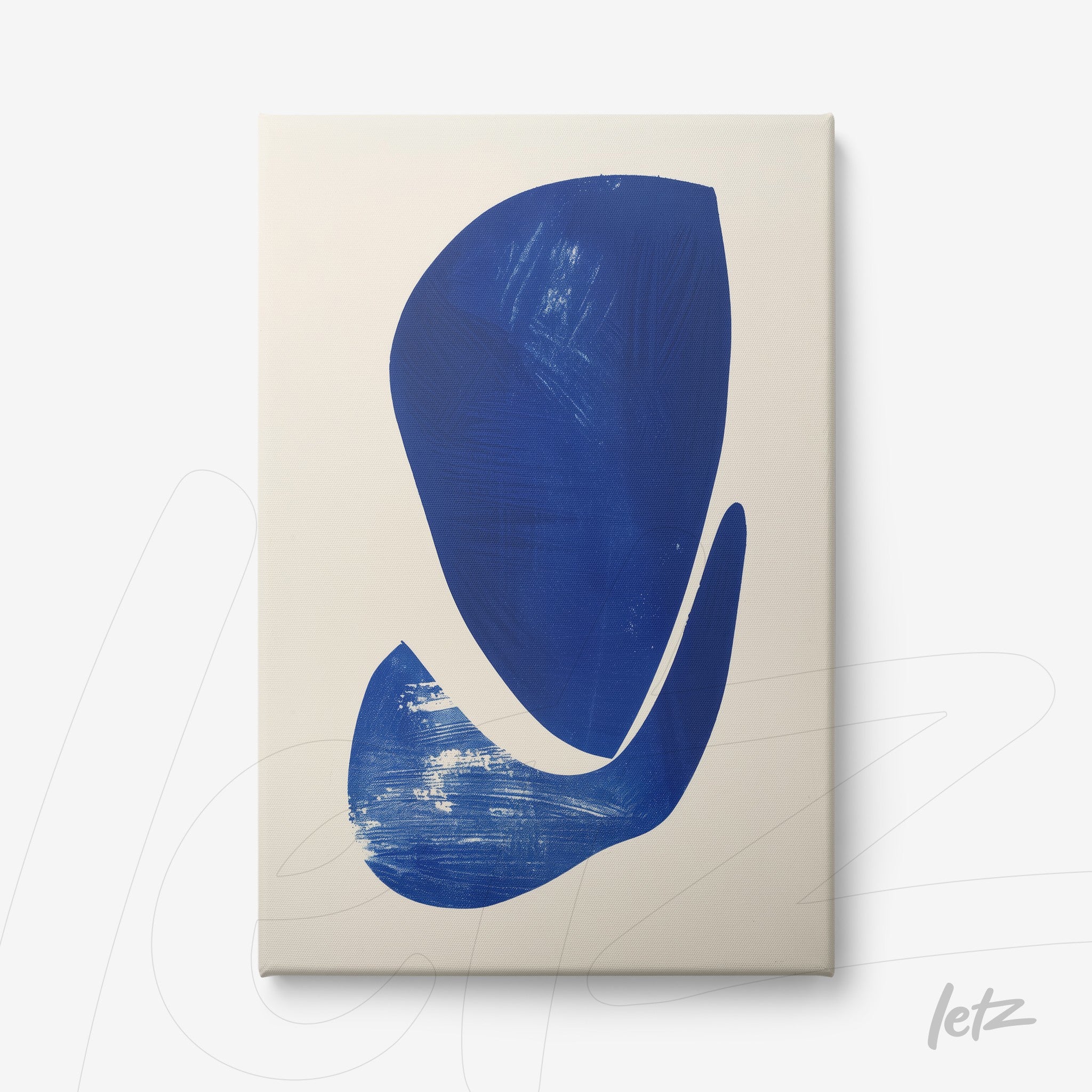 canvas wall art featuring abstract geometric shapes in shades of blue on a light background