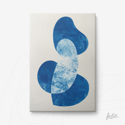canvas artwork featuring organic shapes in blue tones on a light background