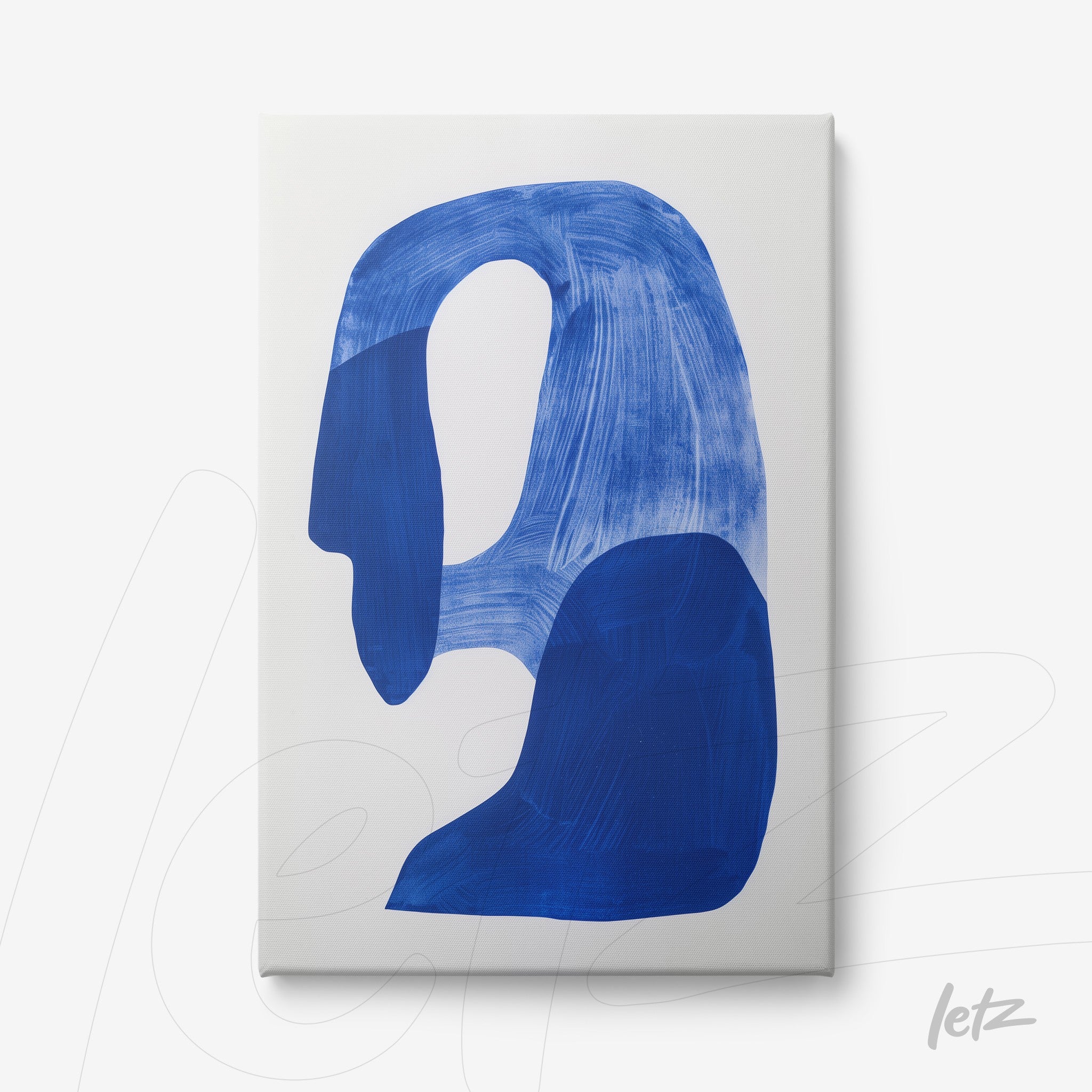 canvas artwork featuring abstract blue shapes on a white background, showcasing organic forms