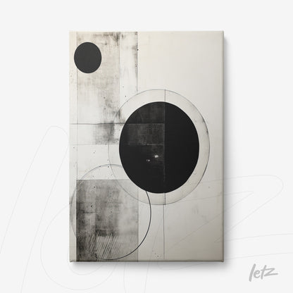 canvas art featuring abstract black and white design with large and small circles on a light background