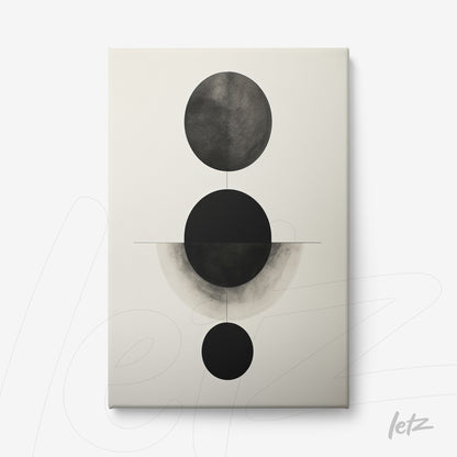 canvas artwork featuring abstract black and white design with circles of varying sizes on a light background