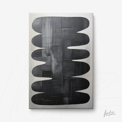 canvas artwork featuring abstract black and gray shapes on a light background with smooth curves