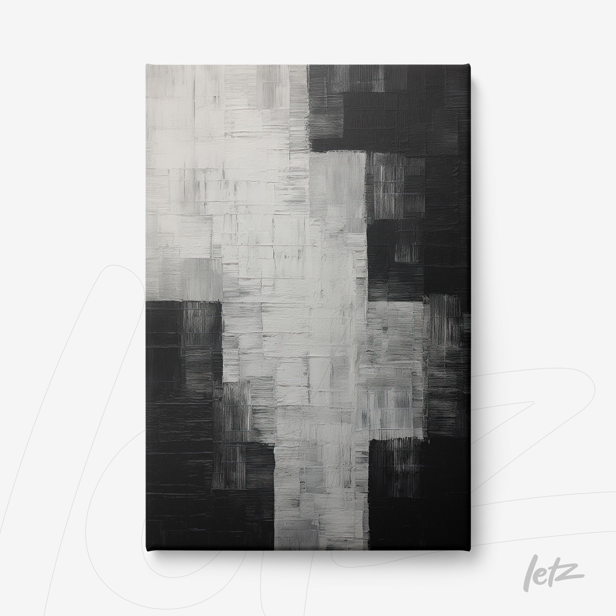 canvas artwork featuring abstract design in black and white with rich textures and visible brush strokes