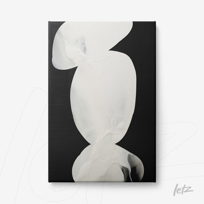 canvas art featuring abstract white shapes on a black background