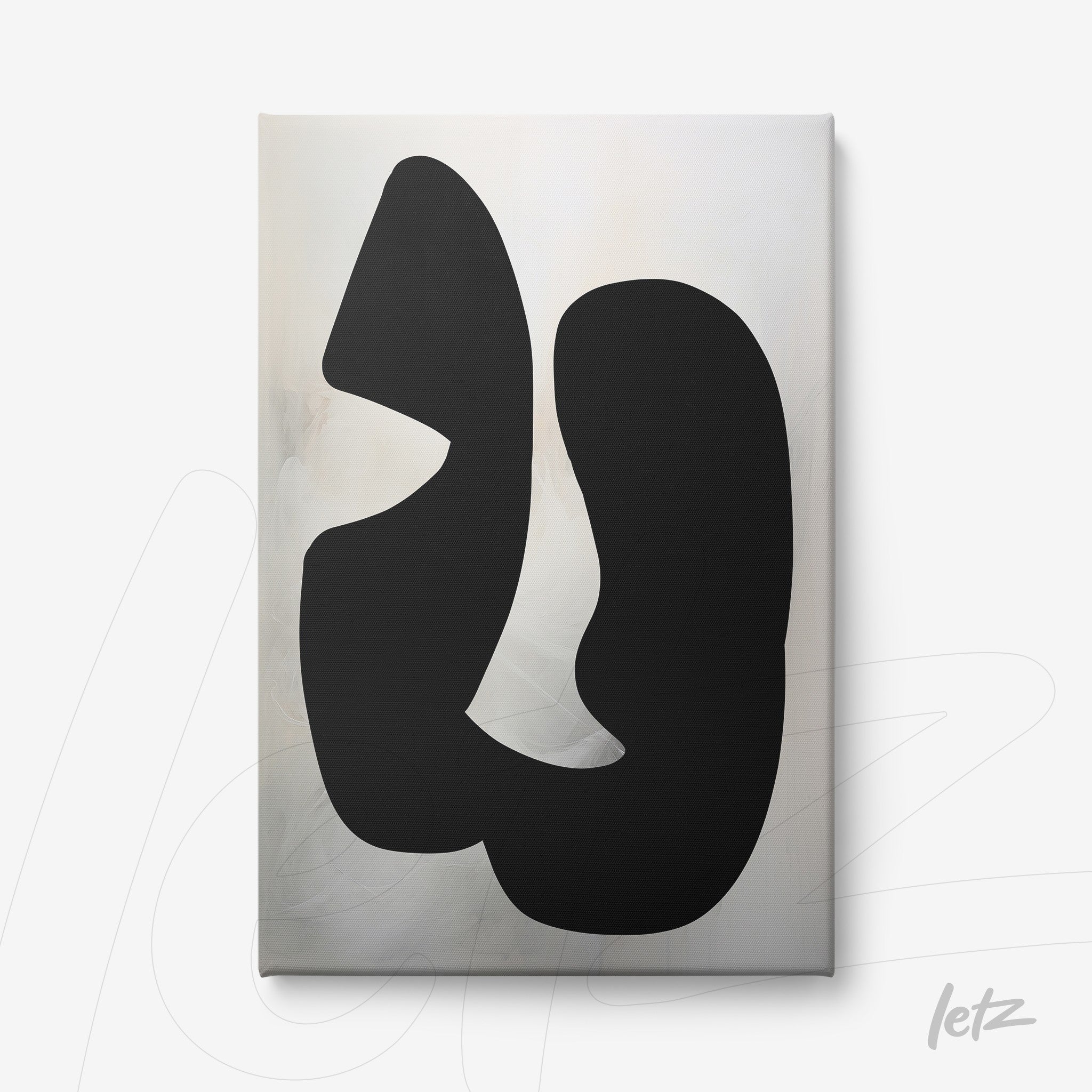 canvas artwork featuring abstract black shapes on a light background with subtle textures