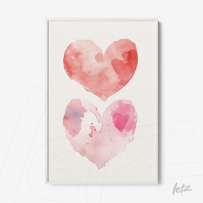 framed watercolor art featuring two hearts in shades of pink and red
