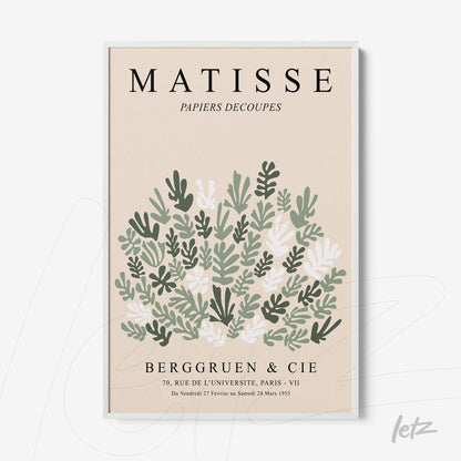 framed artwork inspired by matisse's paper cutouts featuring green and white leaves on a nude background with a white frame