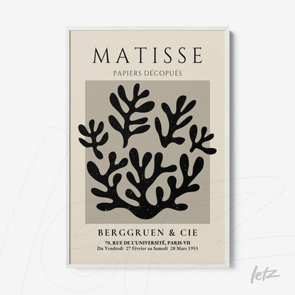 framed modern art featuring abstract plant shapes in white background with black text