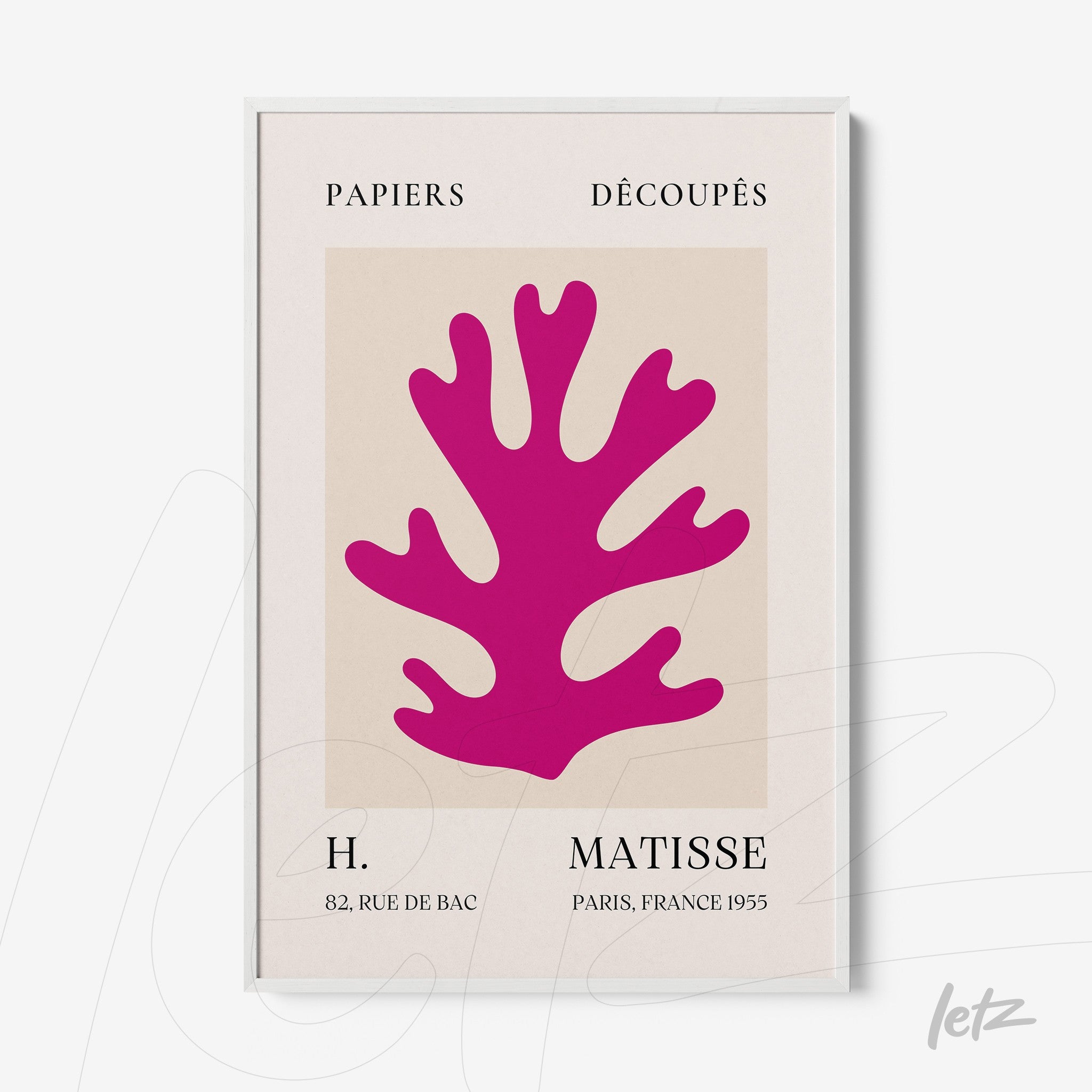 framed modern art of coral design in neutral background with white frame and stylized text