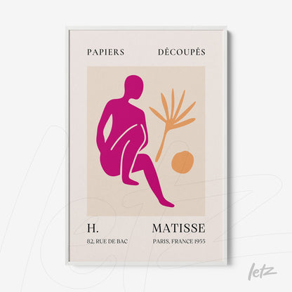 framed artwork featuring a modern style depiction of a stylized seated figure in pink and orange tones, with a plant in the background