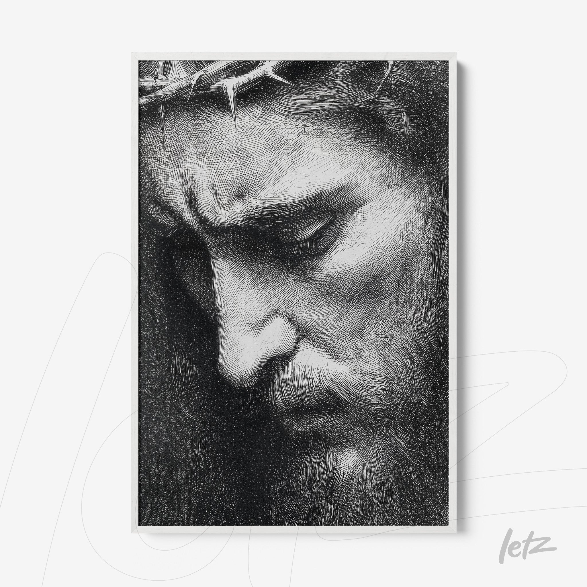 framed black and white artwork depicting an expressive portrait of Christ with details of the crown of thorns