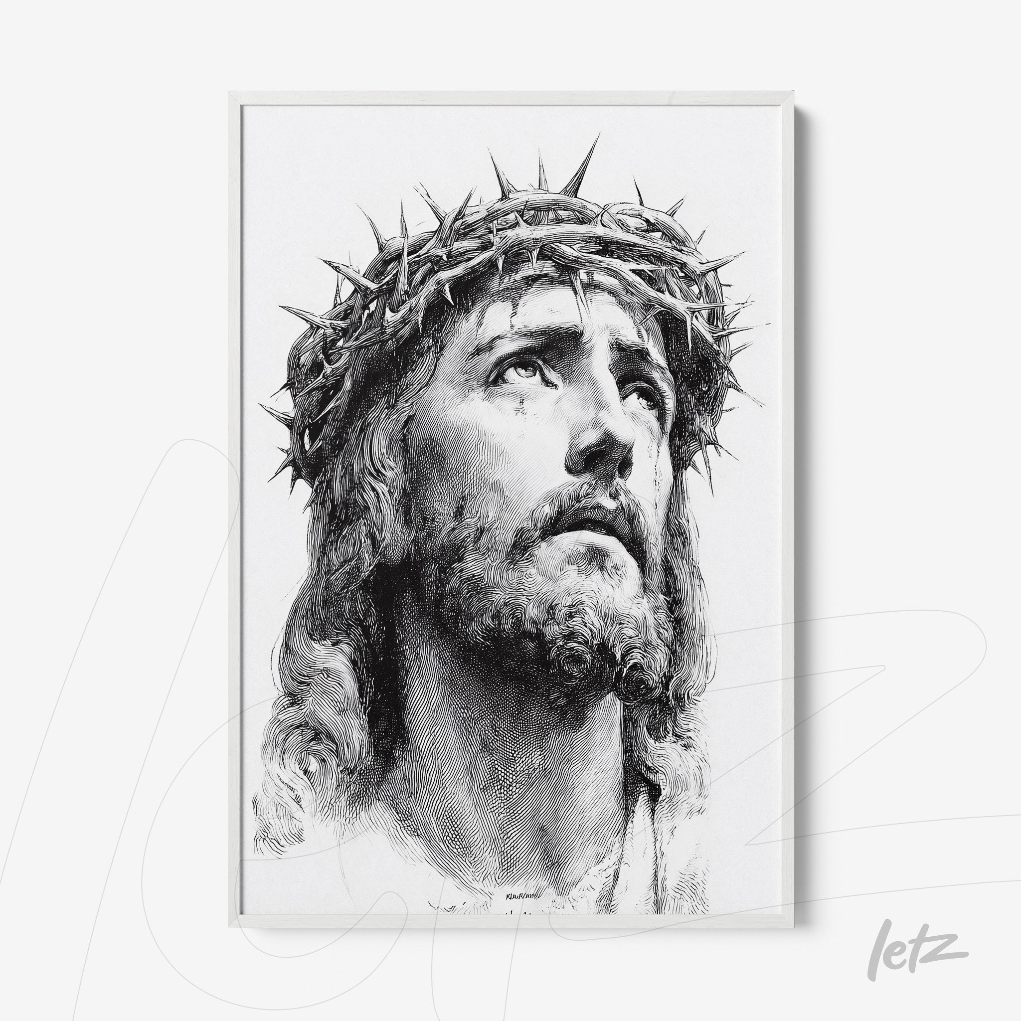 framed black and white portrait of Jesus Christ with a crown of thorns in a white frame
