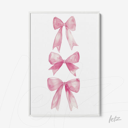 framed artwork featuring pink ribbon illustrations on a white background