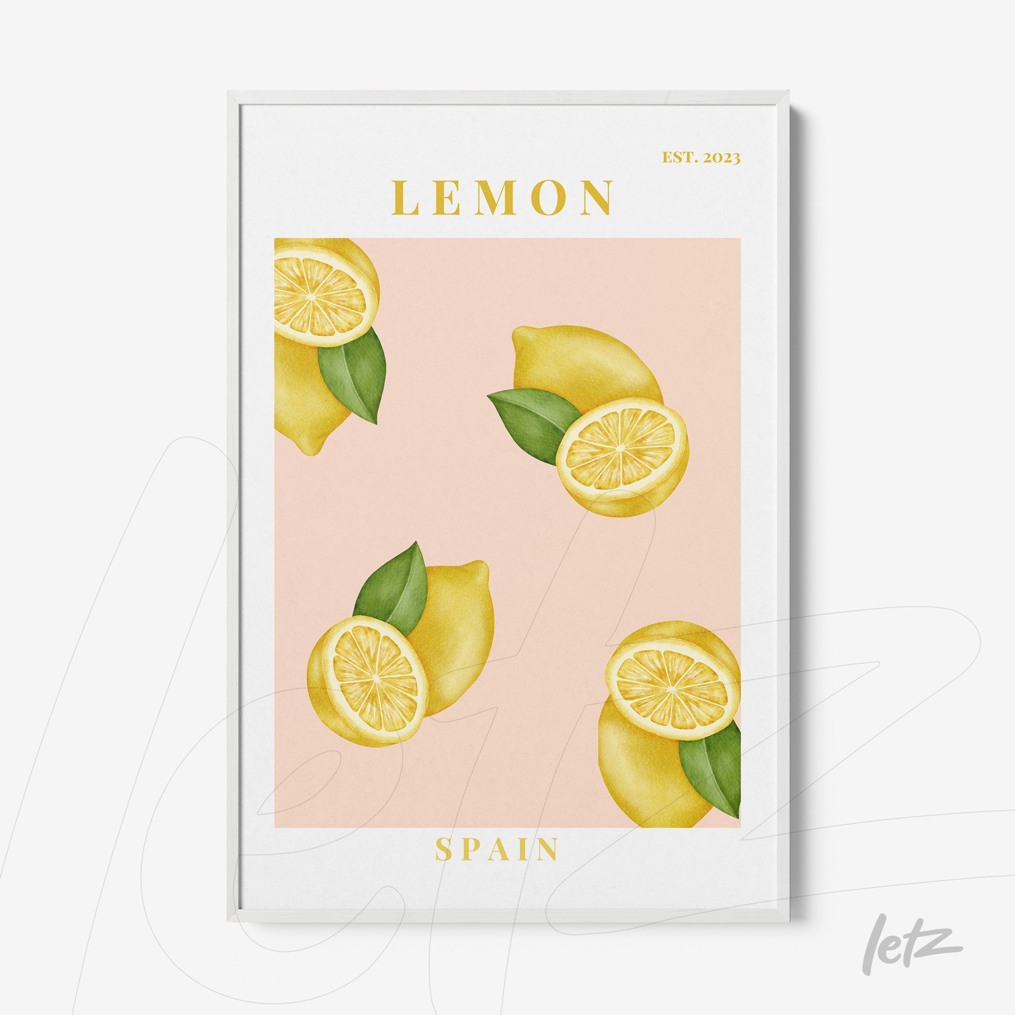 framed art featuring lemons on a light pink background with white frame and gold text