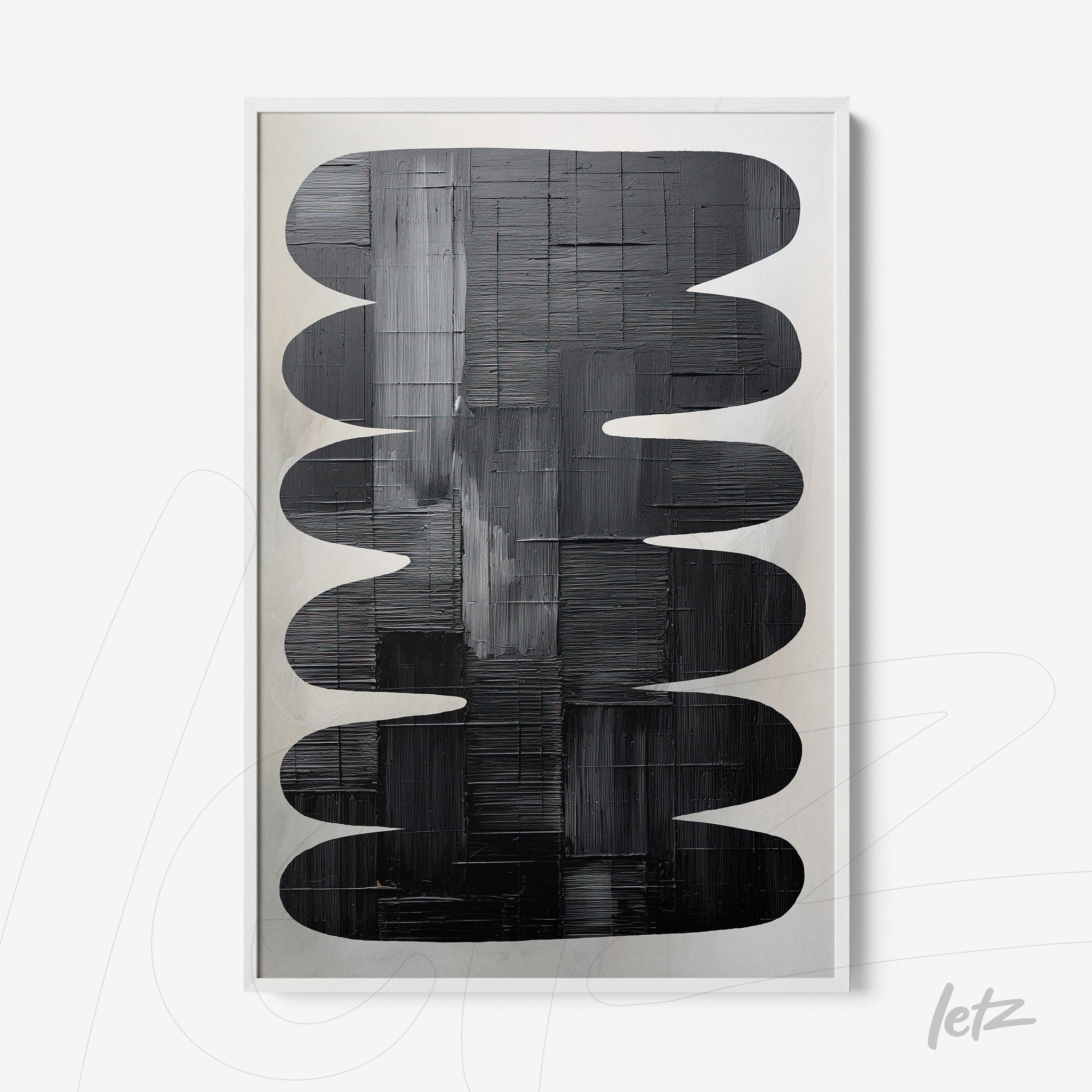 framed artwork featuring bold abstract shapes in black and gray with striking texture