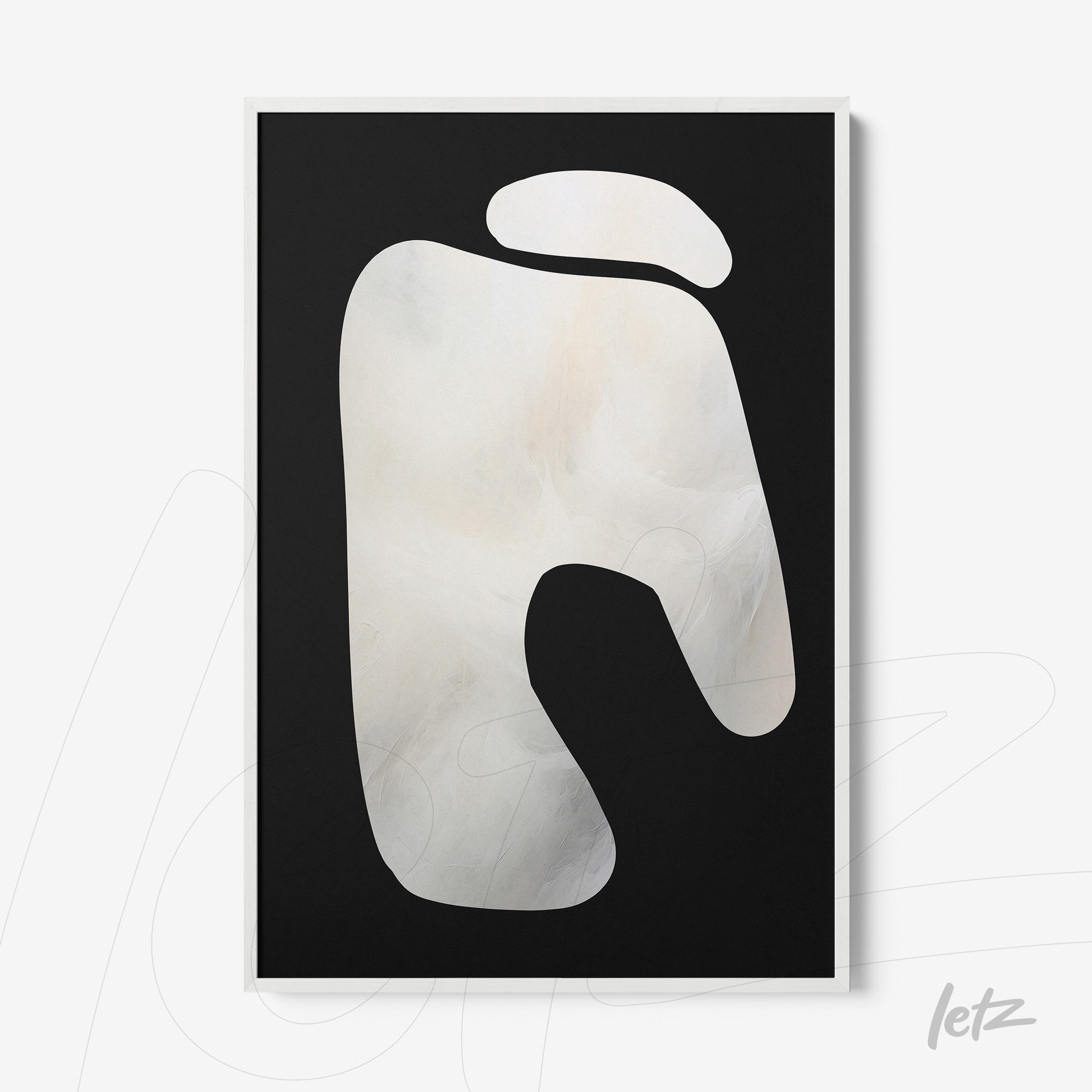 framed abstract art piece with light shades on a black background in white frame