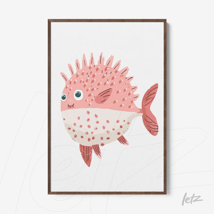 framed artwork featuring a pink spiky fish with large eyes and a white belly set in a dark wooden frame