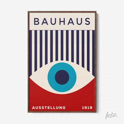 printed poster with bauhaus geometric design in dark wood frame