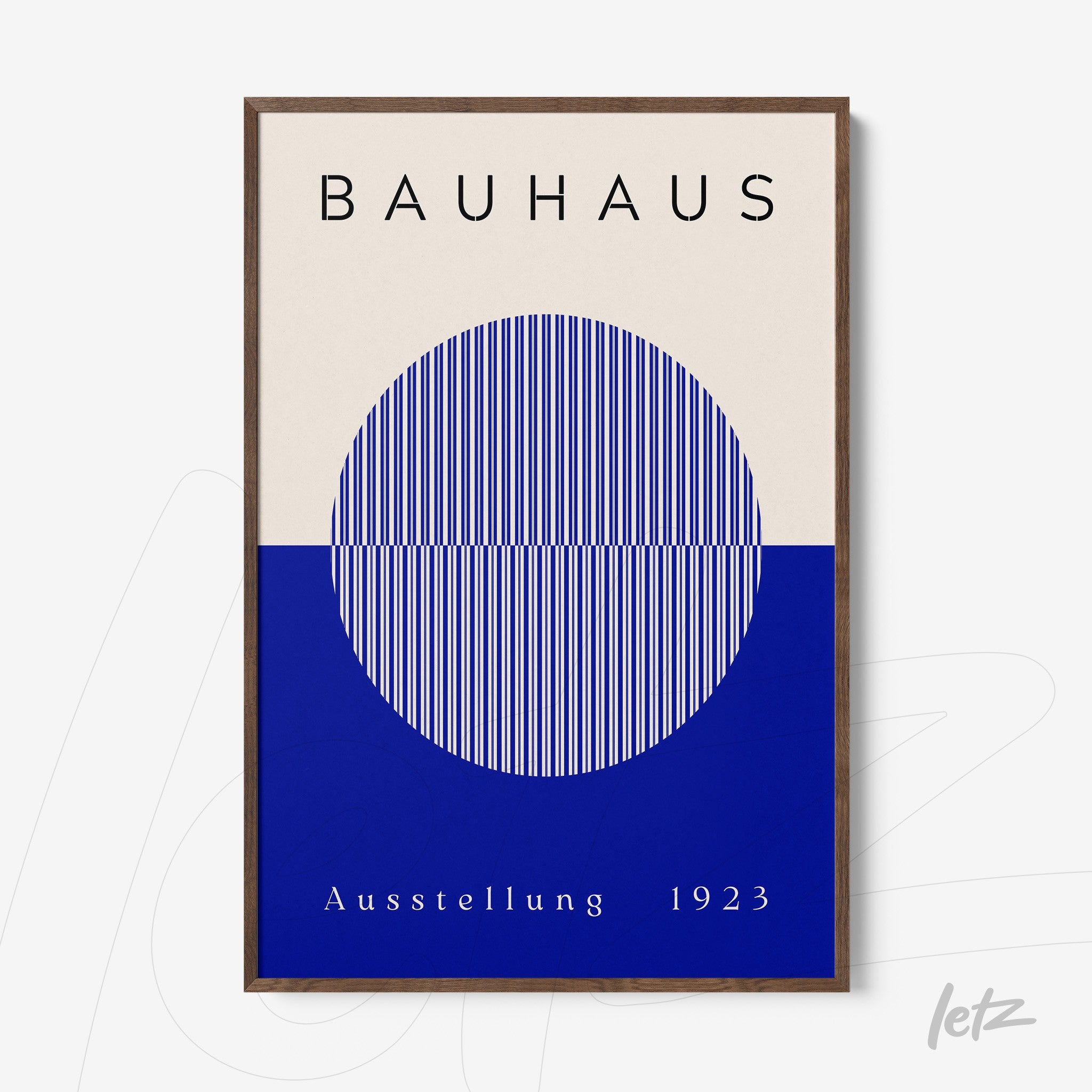 framed art displays bauhaus design with navy blue lined circle and text on beige and blue background