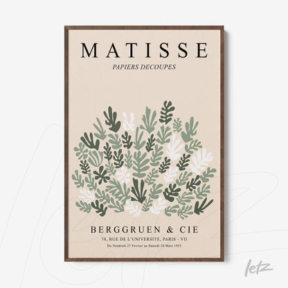 framed art inspired by Matisse featuring organic shapes in green and off-white with dark wood frame