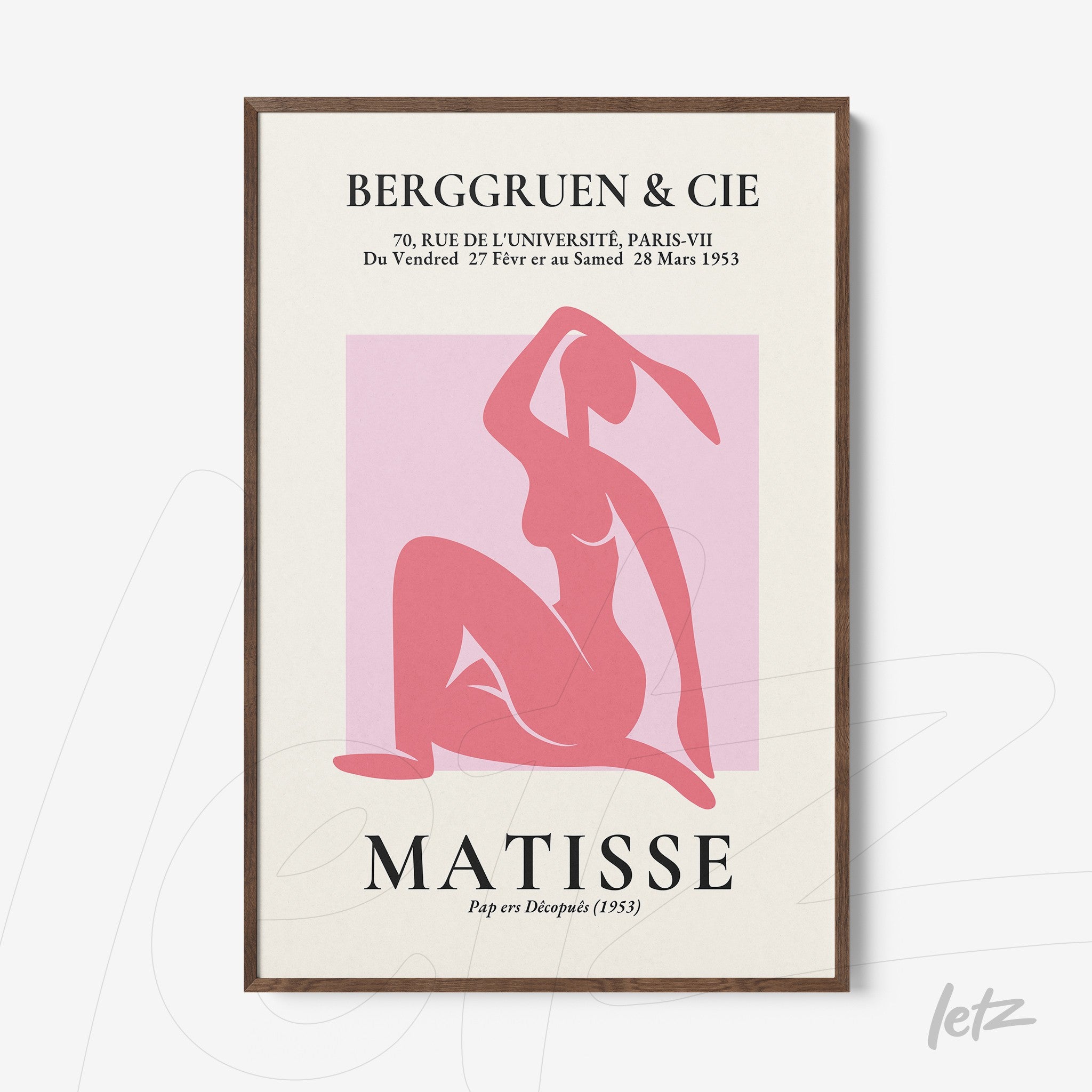 framed artwork featuring a minimalist depiction of a female figure in pink tones on a light background with French text