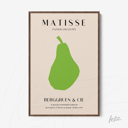 framed wall art featuring a minimalist green pear on light background with dark wooden frame