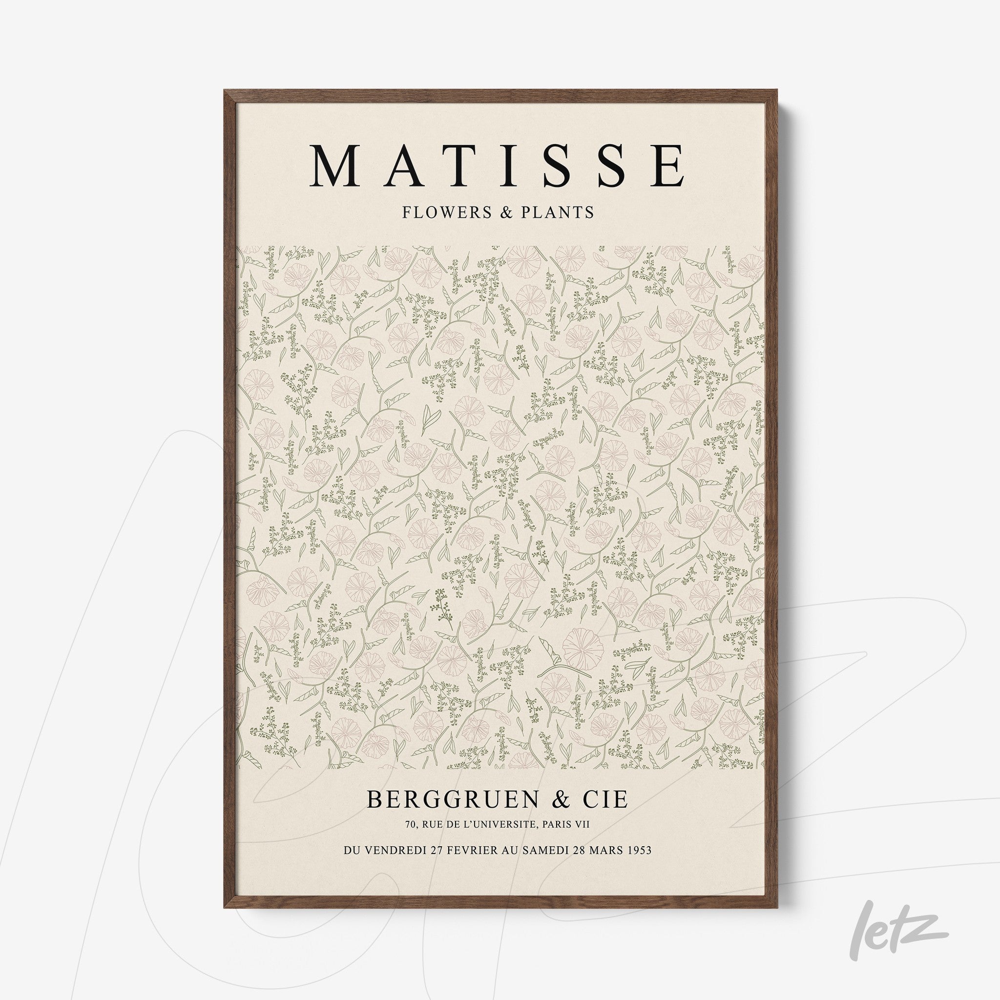framed wall art featuring floral and plant patterns on a light background with dark wood frame