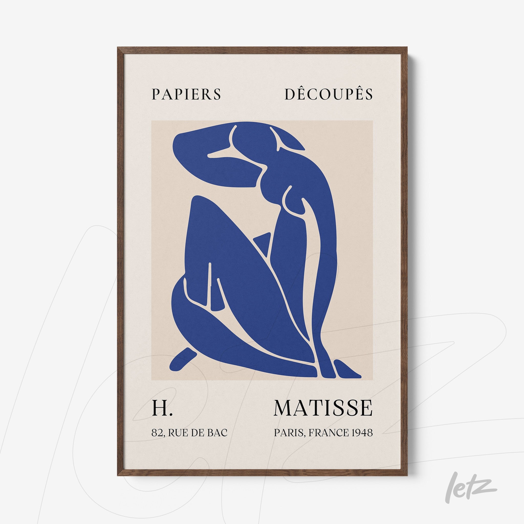 modern art framed print in blue and cream depicting a female figure with dark wood frame