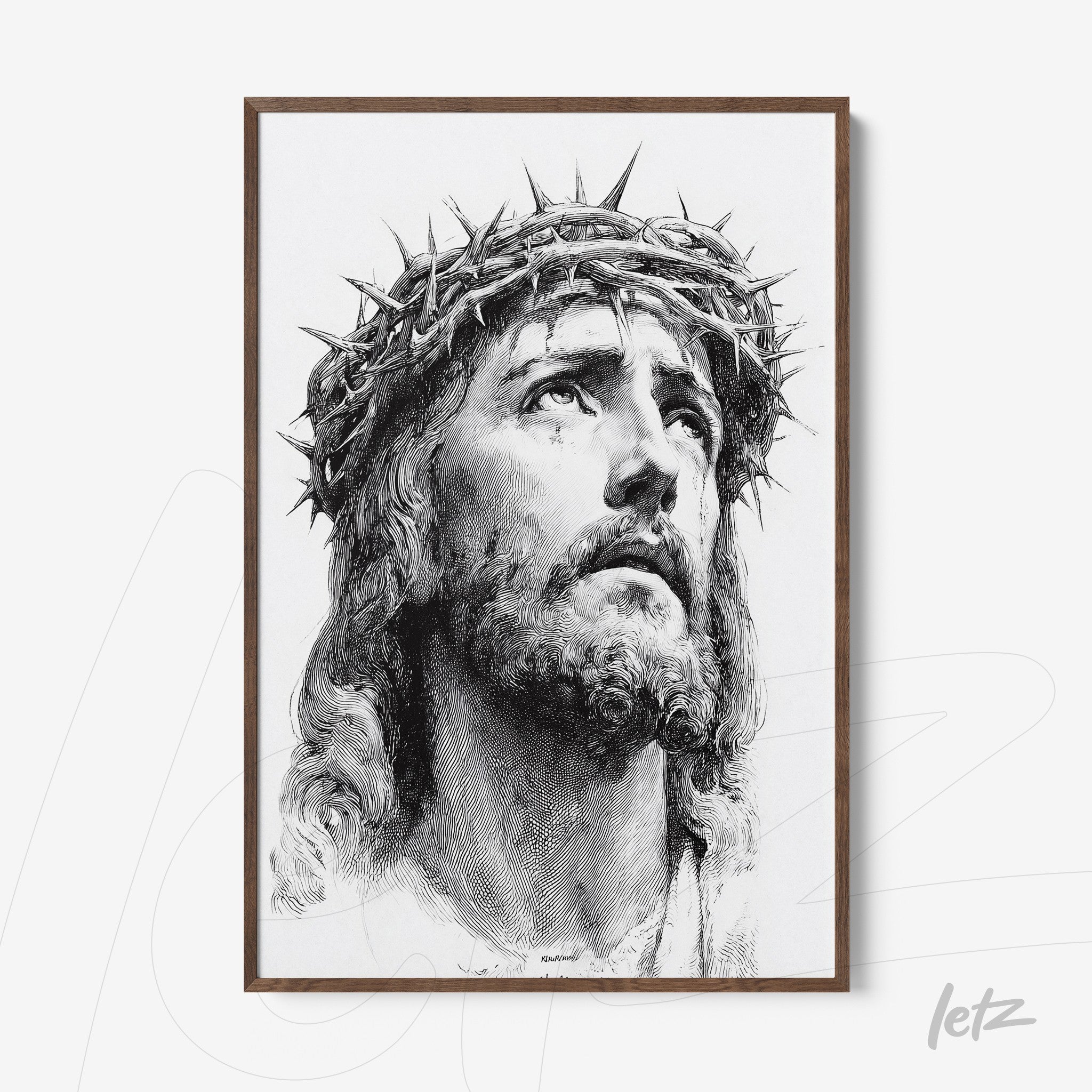 framed wall art of a black and white portrait of Jesus Christ, highlighting the crown of thorns and a serene expression