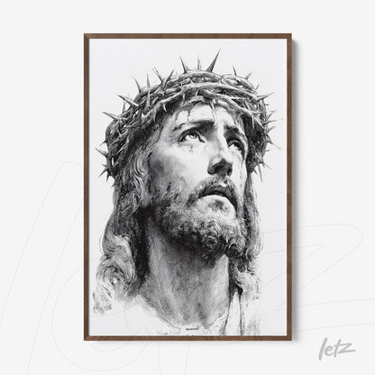 framed wall art of a black and white portrait of Jesus Christ, highlighting the crown of thorns and a serene expression