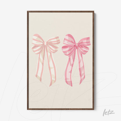 framed artwork featuring pink ribbon illustrations with dark wooden frame