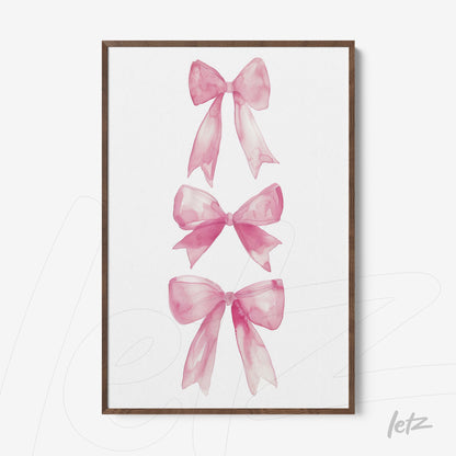 framed artwork with three pink watercolor bows on white background