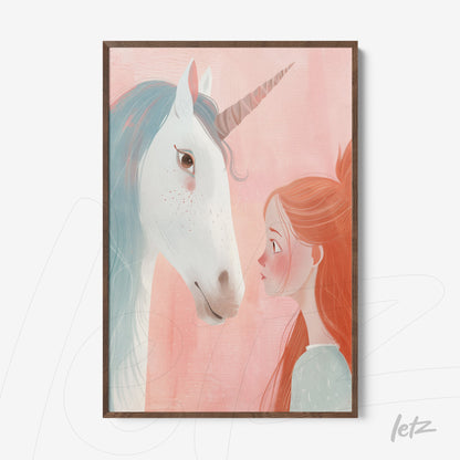 framed illustration of a girl gazing at a white unicorn on a soft pink background with a dark wood frame