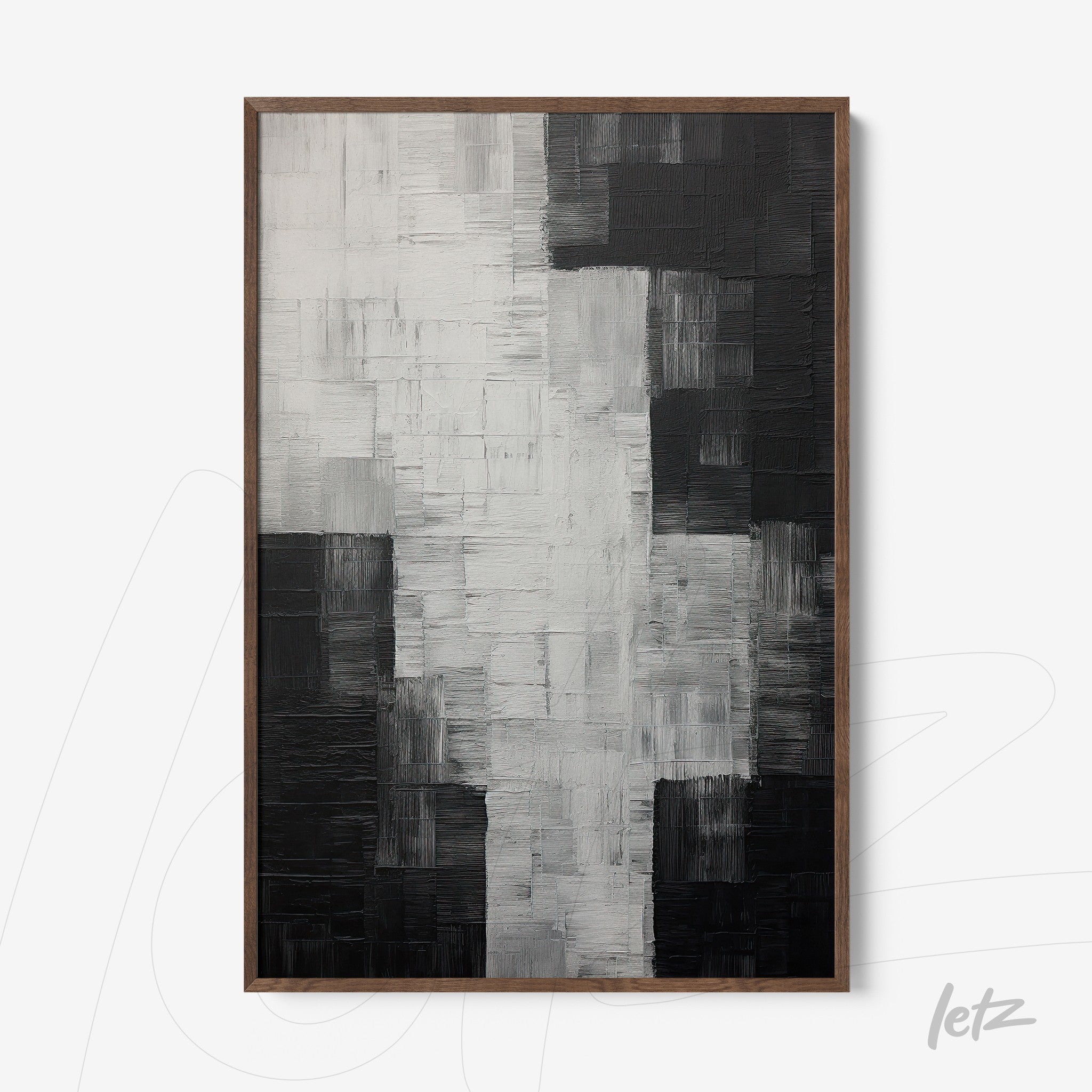 abstract artwork in shades of black and white with deep textures in dark wooden frame