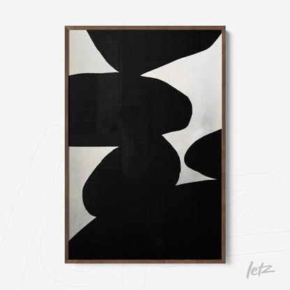 modern framed art featuring abstract black and white design with light wood frame